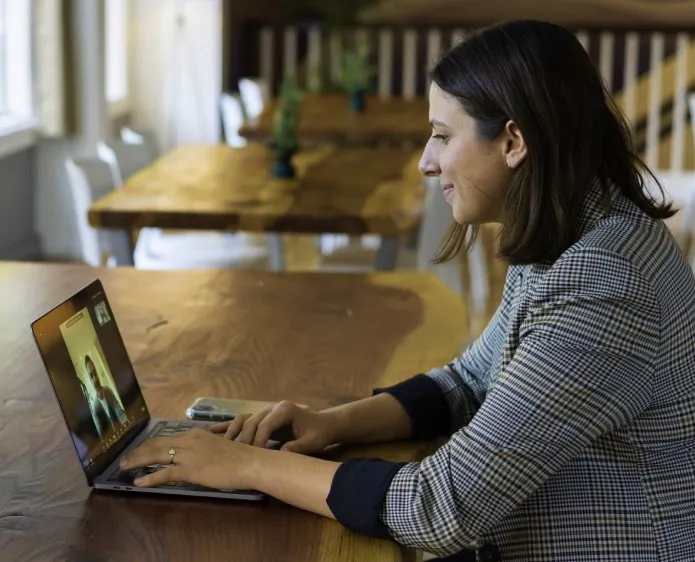 A laptop and notebook ready for reading and learning